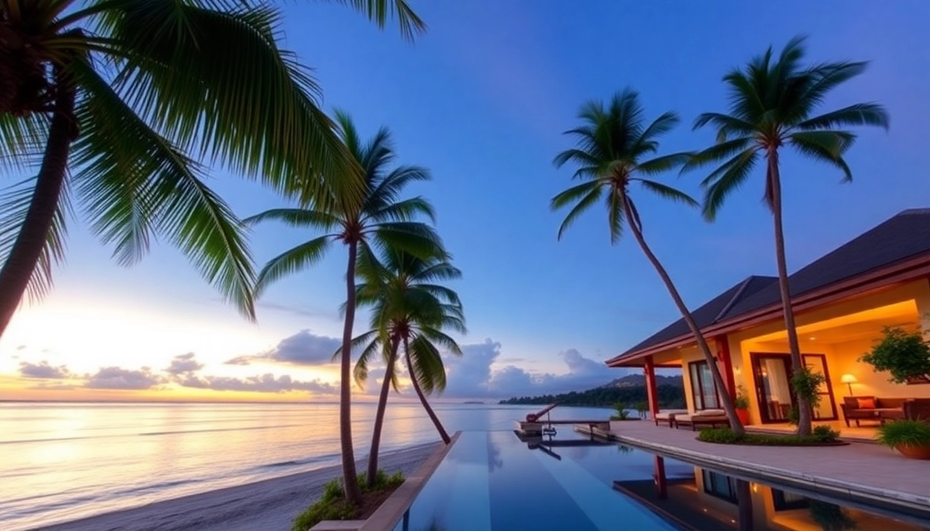 Experience the allure of Phuket real estate with a stunning beachfront villa under a vibrant sunset.